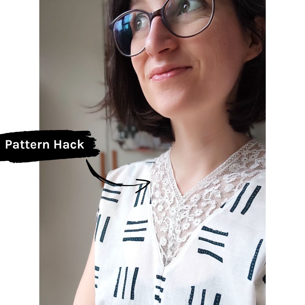 Spitze am Ausschnitt ergänzt